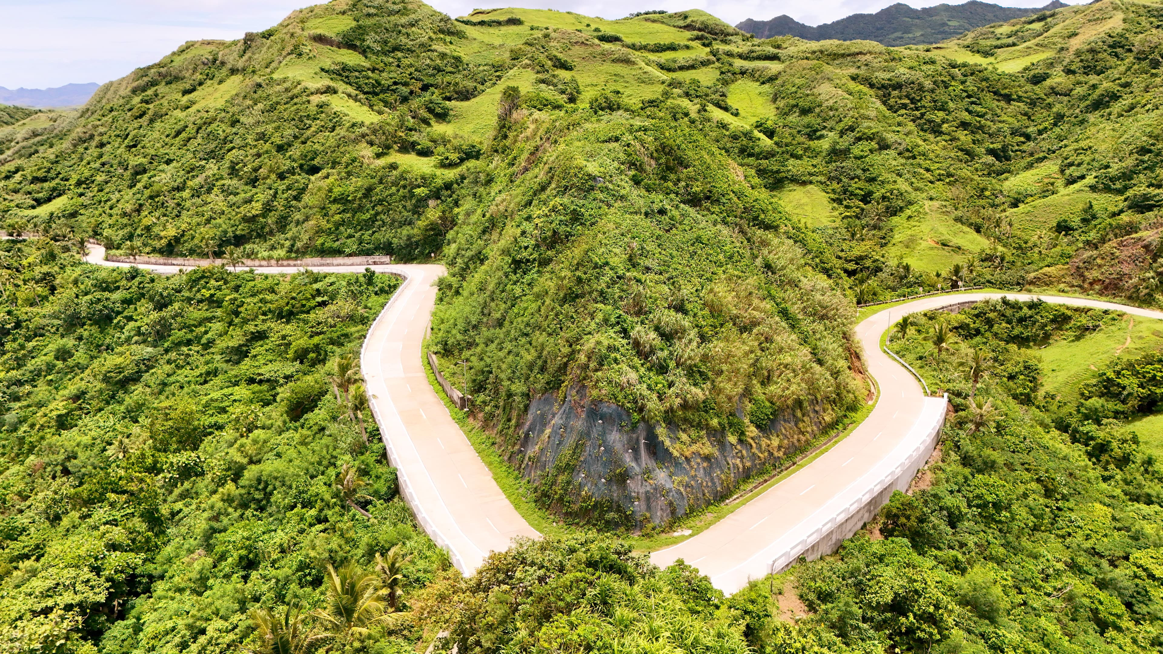 A winding road through Batanes hills