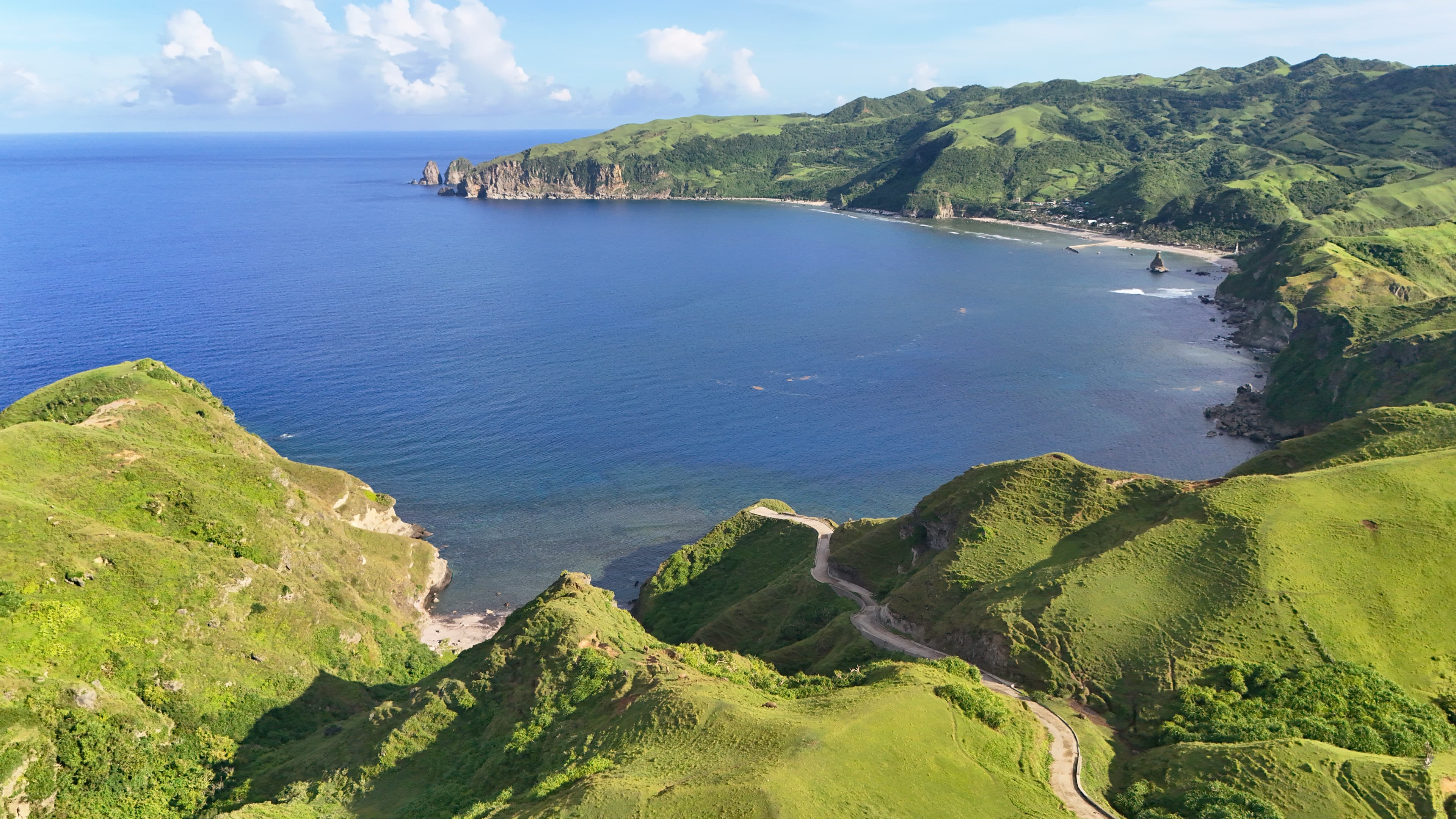 A sweeping coastline in South Batan